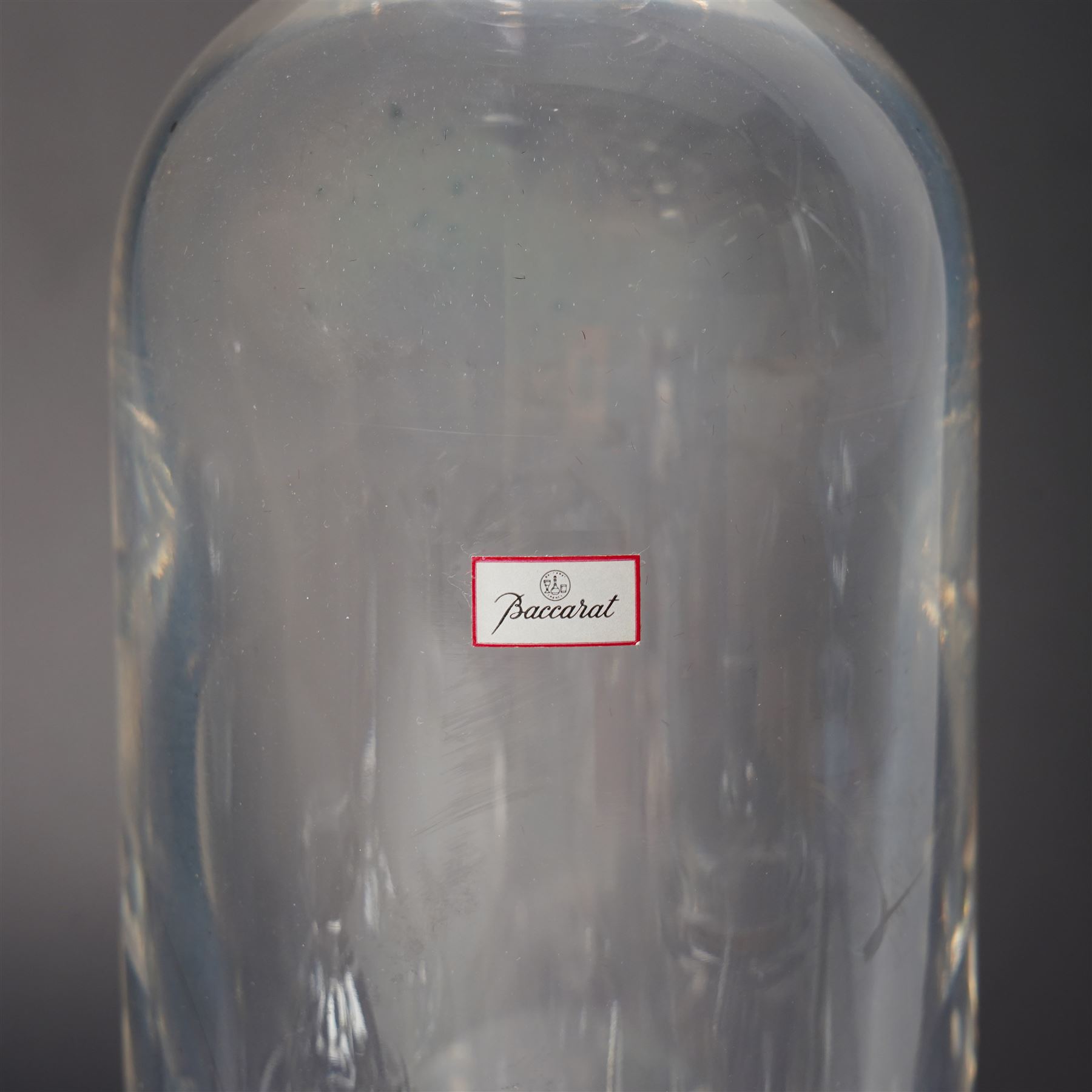 Collection of Baccarat Crystal, comprising a 'Pluton' decanter and two smaller examples, two covered condiment jars, pair of salt cellars, and an ashtray, variously boxed