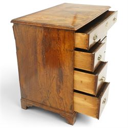 George III figured walnut kneehole desk, the rectangular top with feather and cross-banding with moulded edge, fitted with single frieze drawer over pierced spandrels and recessed cupboard, flanked by six graduating drawers, raised on bracket feet
Provenance: Kirkham Hall