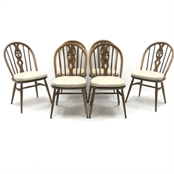 Ercol elm Old Colonial extending pedestal dining table with single leaf (W115cm and 165cm, H73cm, D115cm) and set six hoop back dining chairs (W43cm) 