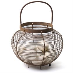 Wire crock containing 11 broody hen ceramic dummy eggs, two marked 'Caperns' 