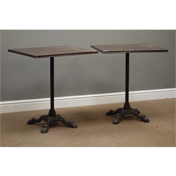  Two square top pub/bistro tables on ornate cast metal bases. 61cm x 61cm, H71cm  