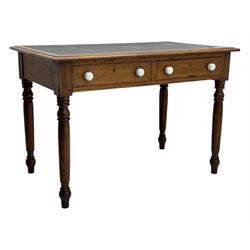 Victorian pine writing table, rectangular top with moulded edge and inset leather writing surface, the frieze fitted with two short drawers, raised by turned supports 