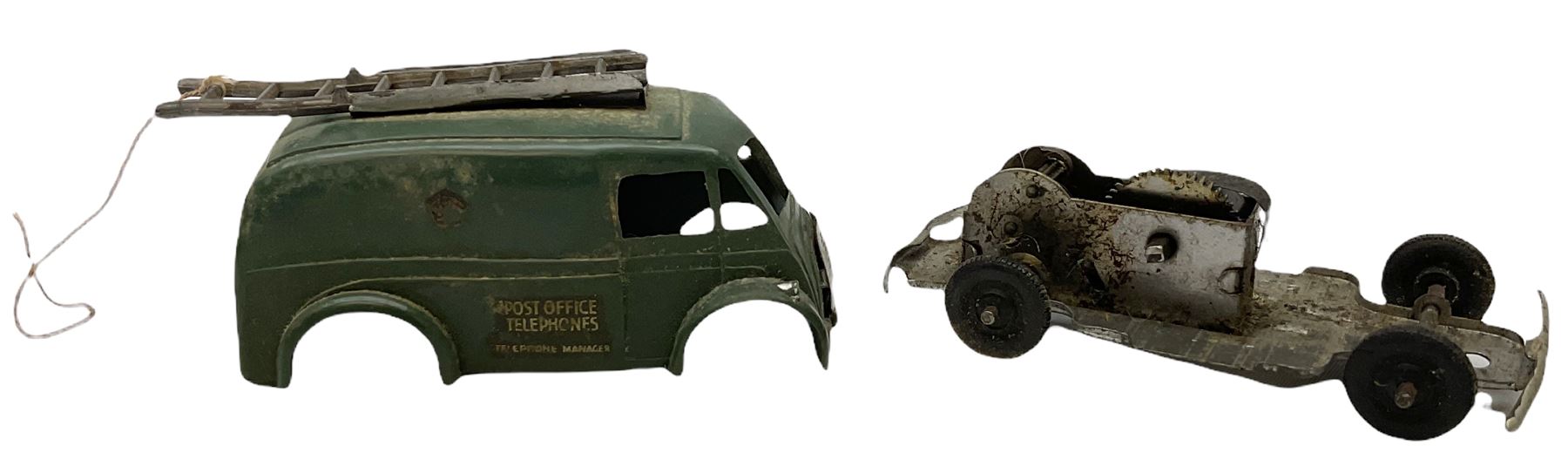 Eight Tri-ang Minic tin-plate/plastic clockwork vehicles comprising Tipper Lorry, Post Office Telephones Van, Caterpillar Tractor, Evening News Van, two Royal Mail Vans, American jeep and saloon car; all unboxed (8)