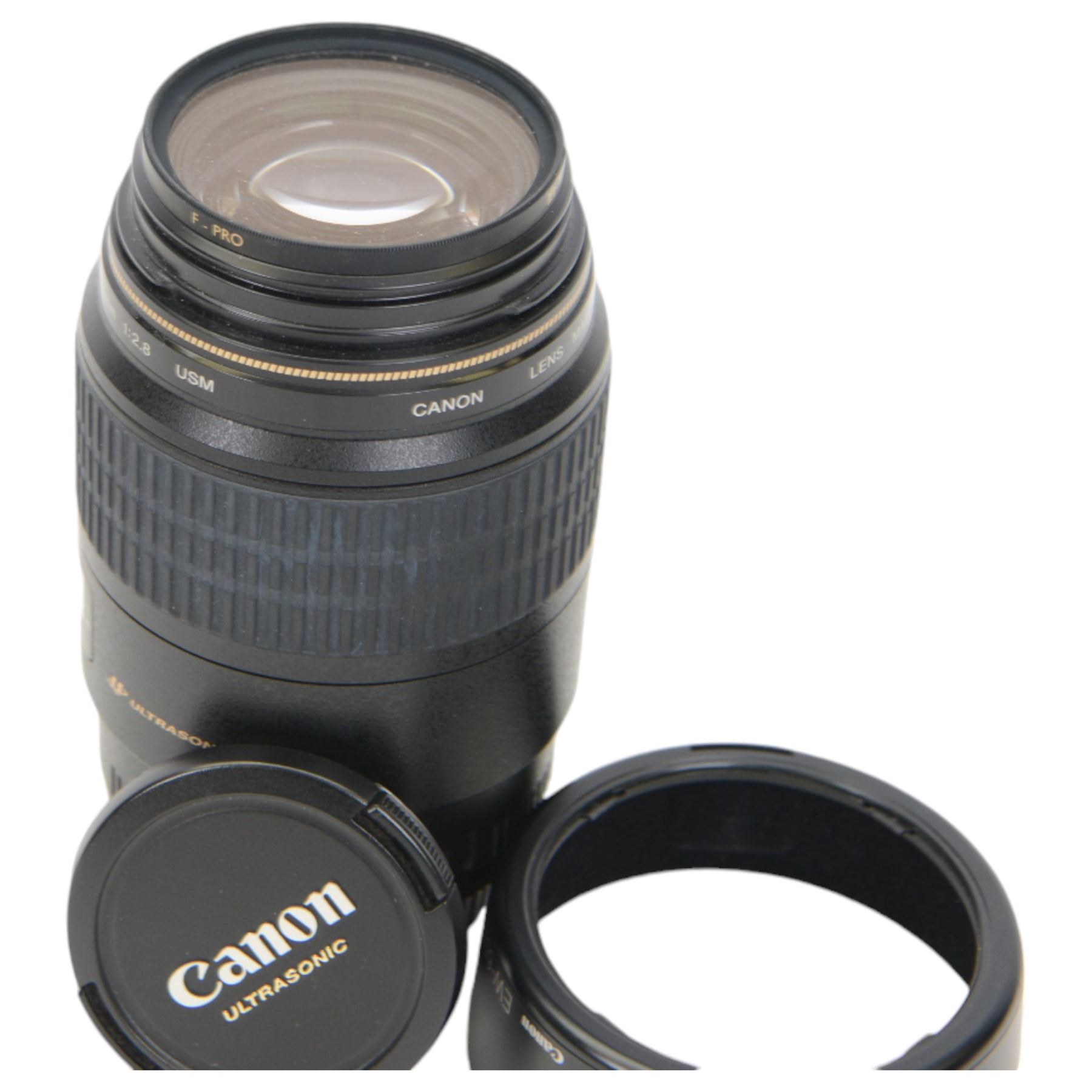 Canon Ultrasonic Macro EF 100mm 1:2.8 lens serial no. 63900365, with Canon EW-65II lens hood, in carry pouch