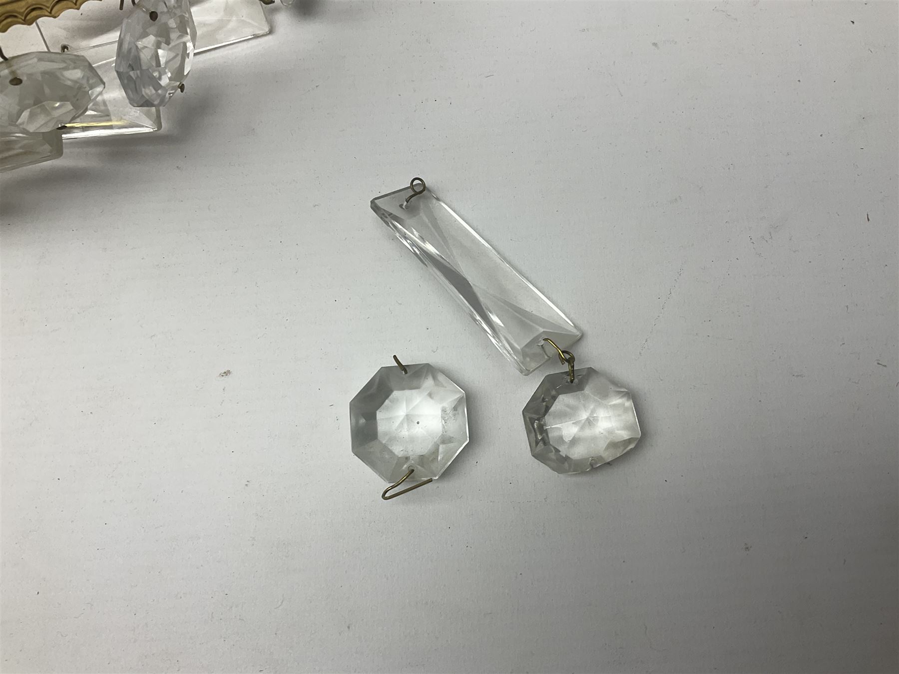 Pair of Marks and Spencer adjustable wall lights, together with a glass chandelier