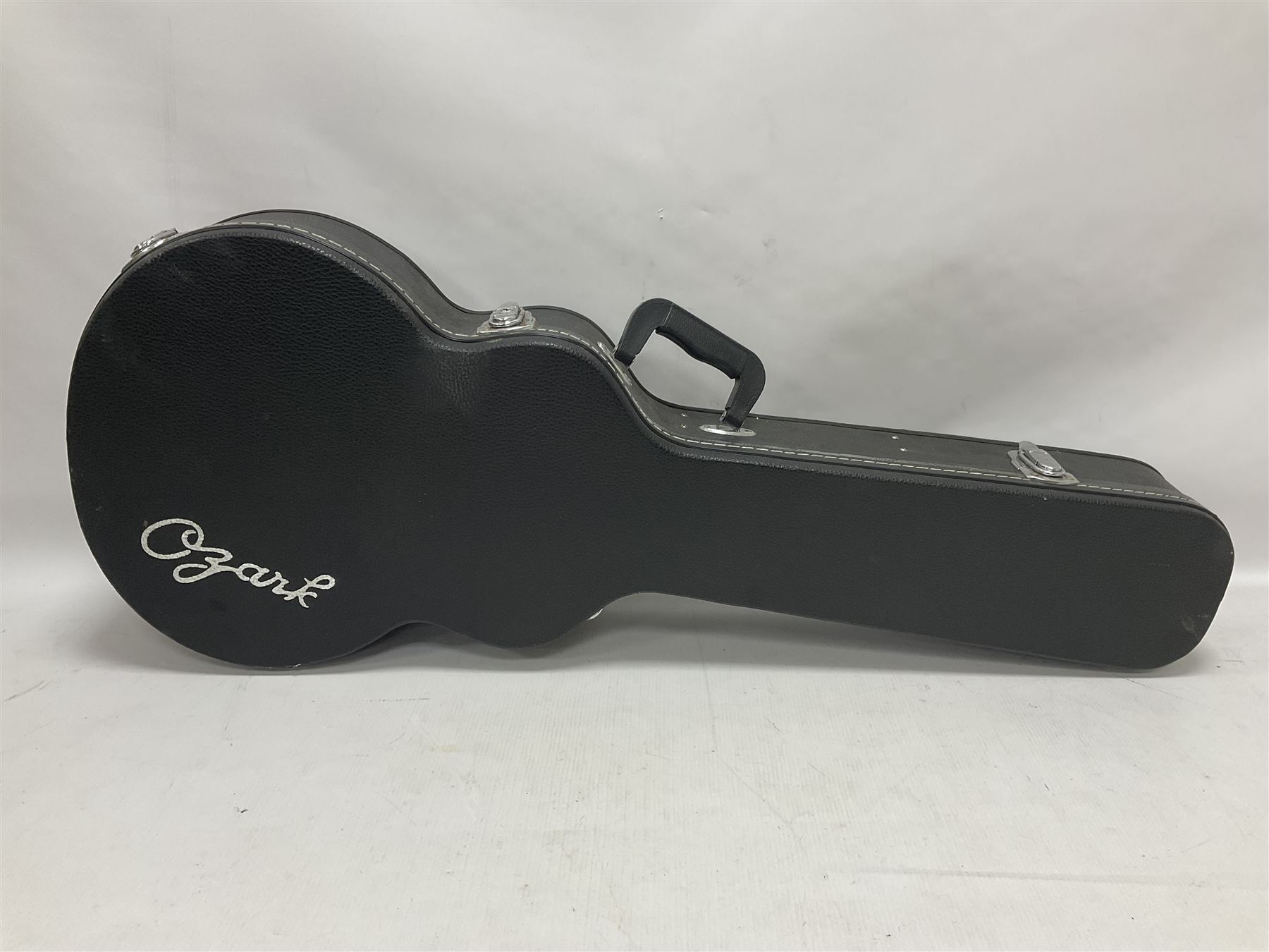 Ozark 'The Ozark Professional' tenor guitar, model no 3372, headstock stamped Ozark and with paper label to interior, in manufacturers hard case, guitar L82cm