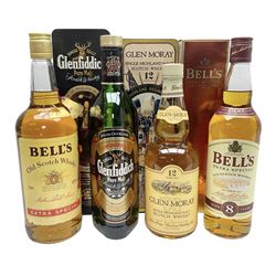 Glen Moray 12 Year Single Malt Highland Scotch Whisky, 70cl 40% vol, one bottle, in Highland Regiments The Black Watch presentation tin, Glenfiddich Pure Malt Scotch Whisky, Special Old Reserve, 70cl 40% vol, one bottle, in Clan Murray presentation tin, Bell's Extra Special Old Scotch Whisky, Aged 8 Years, 70cl 40% vol, one bottle, in box and Bell's Extra Special Old Scotch Whisky, 1l, 43% vol (4)