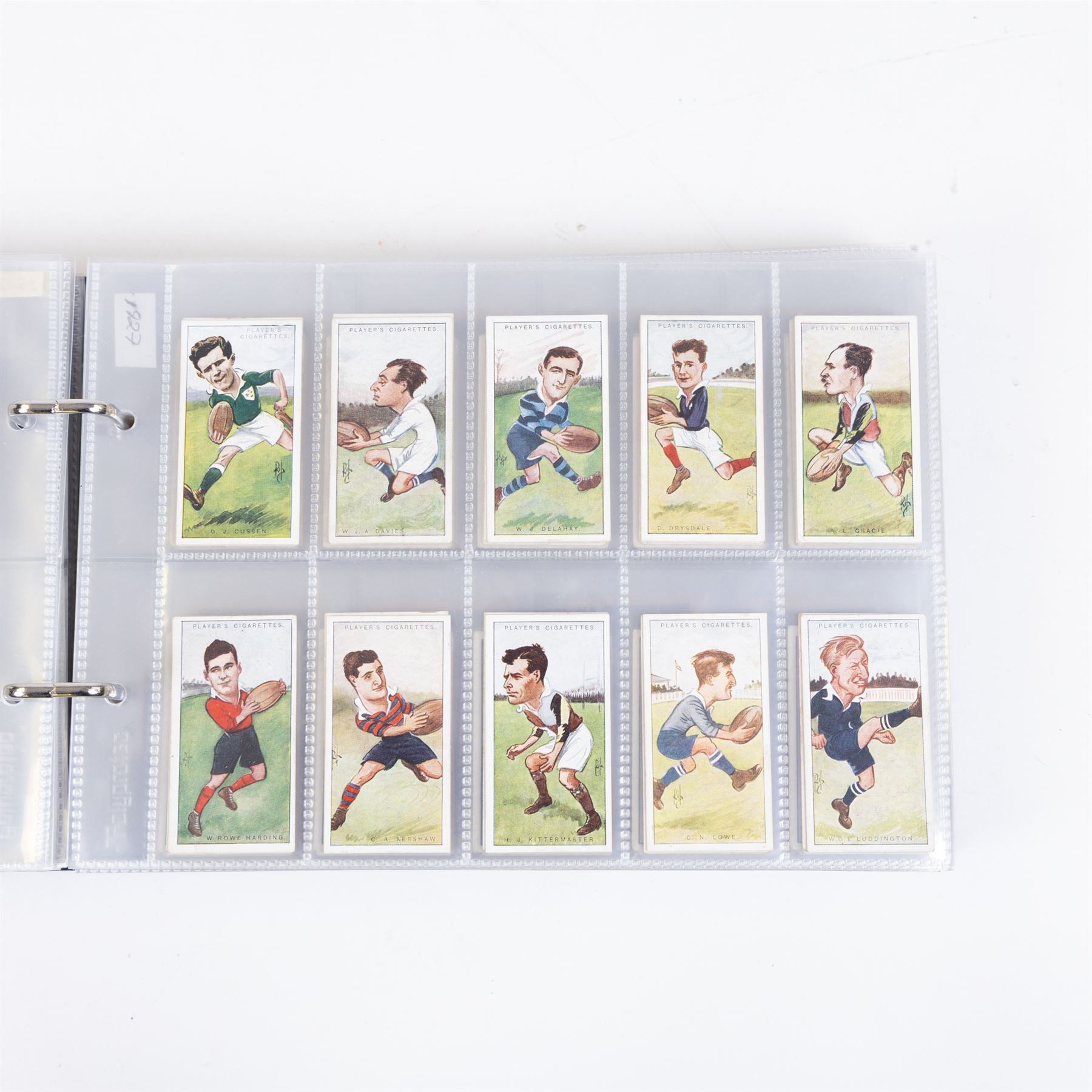 Collection of Edwardian and later Football related trading and cigarette cards, including forty-nine of fifty 1906 Ogden's Football Club Colours, 1922 PALS Footall series, ninety of one hundred 1925 Gallaher Famous Footballers, complete set of forty-four 1926 Ogden's Captains of Association Football Clubs and Colours, complete set of fifty 1927 Players Football Caricatures by MAC,  complete set of fifty 1927 Players Football Caricatures by RIP,  complete set of fifty 1930 Players Association Cup Winners, complete set of 50 1933 Ogdens AFC Nicknames etc, housed in brown cigarette card album