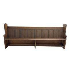 19th century pine church pew, panelled back with shaped end supports 