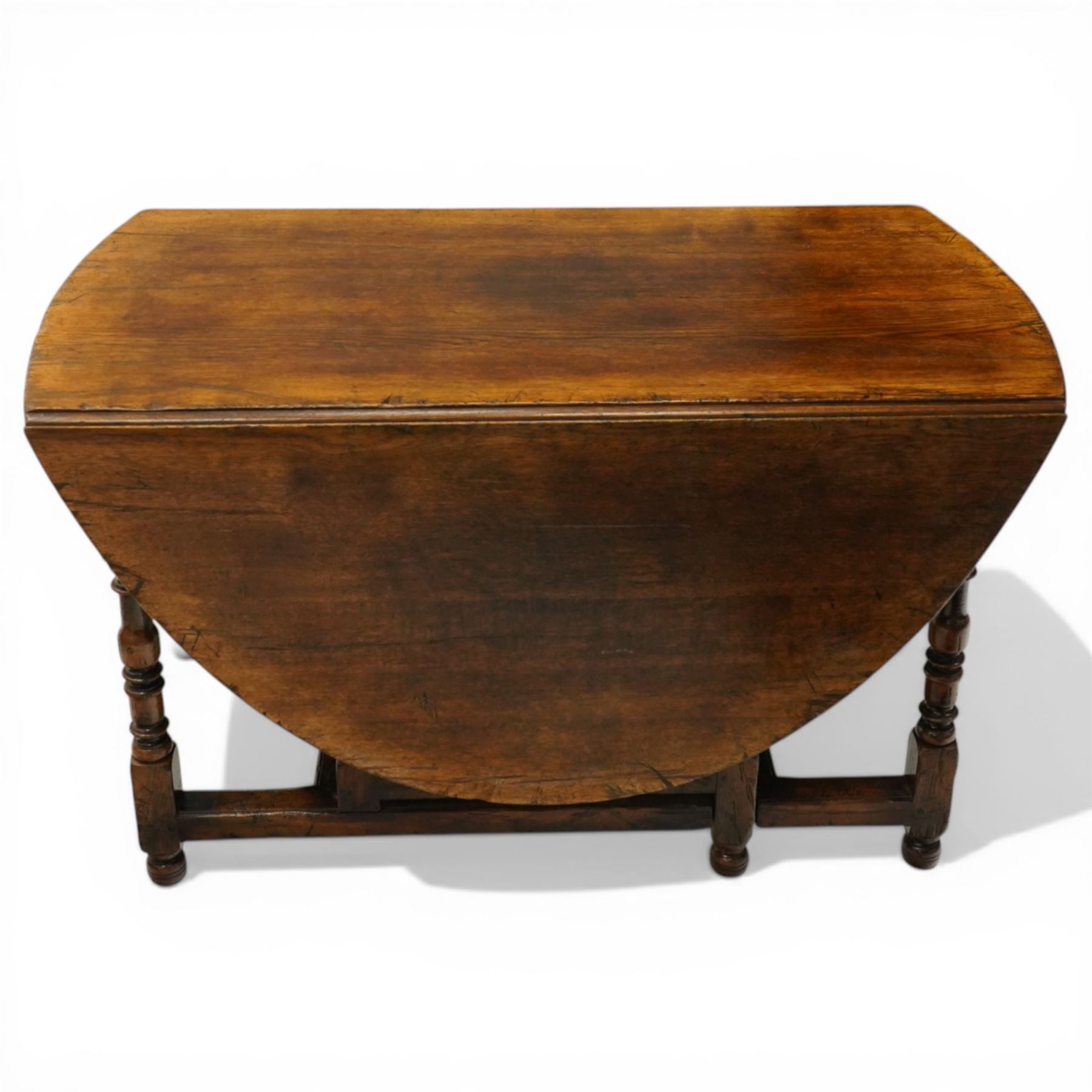 Titchmarsh & Goodwin - oak drop leaf table with double drawer, gateleg turned supports united by stretchers