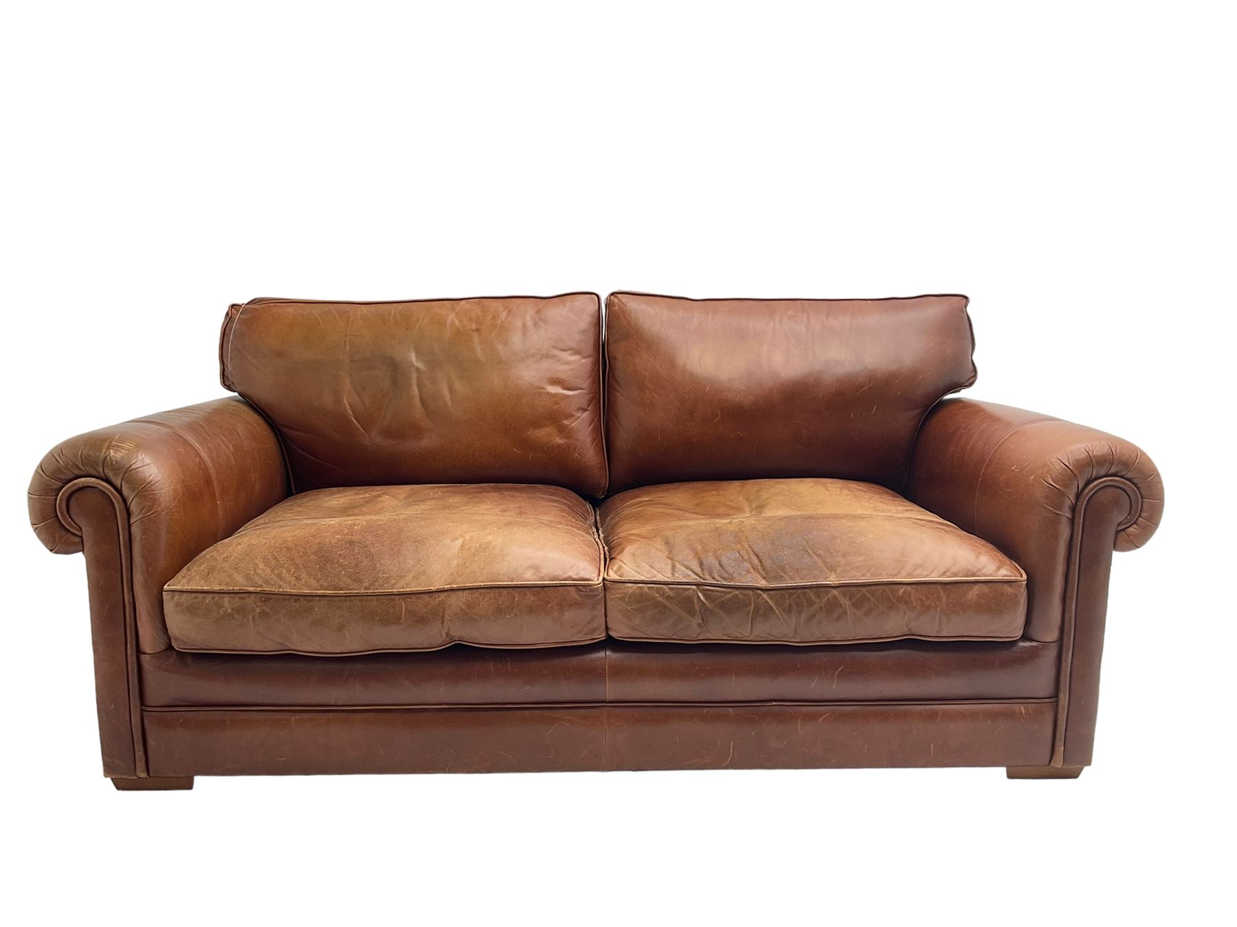Large two seat sofa upholstered in tan 'Derwent' leather (W200cm D100cm H85cm), and matching armchair (W95cm)