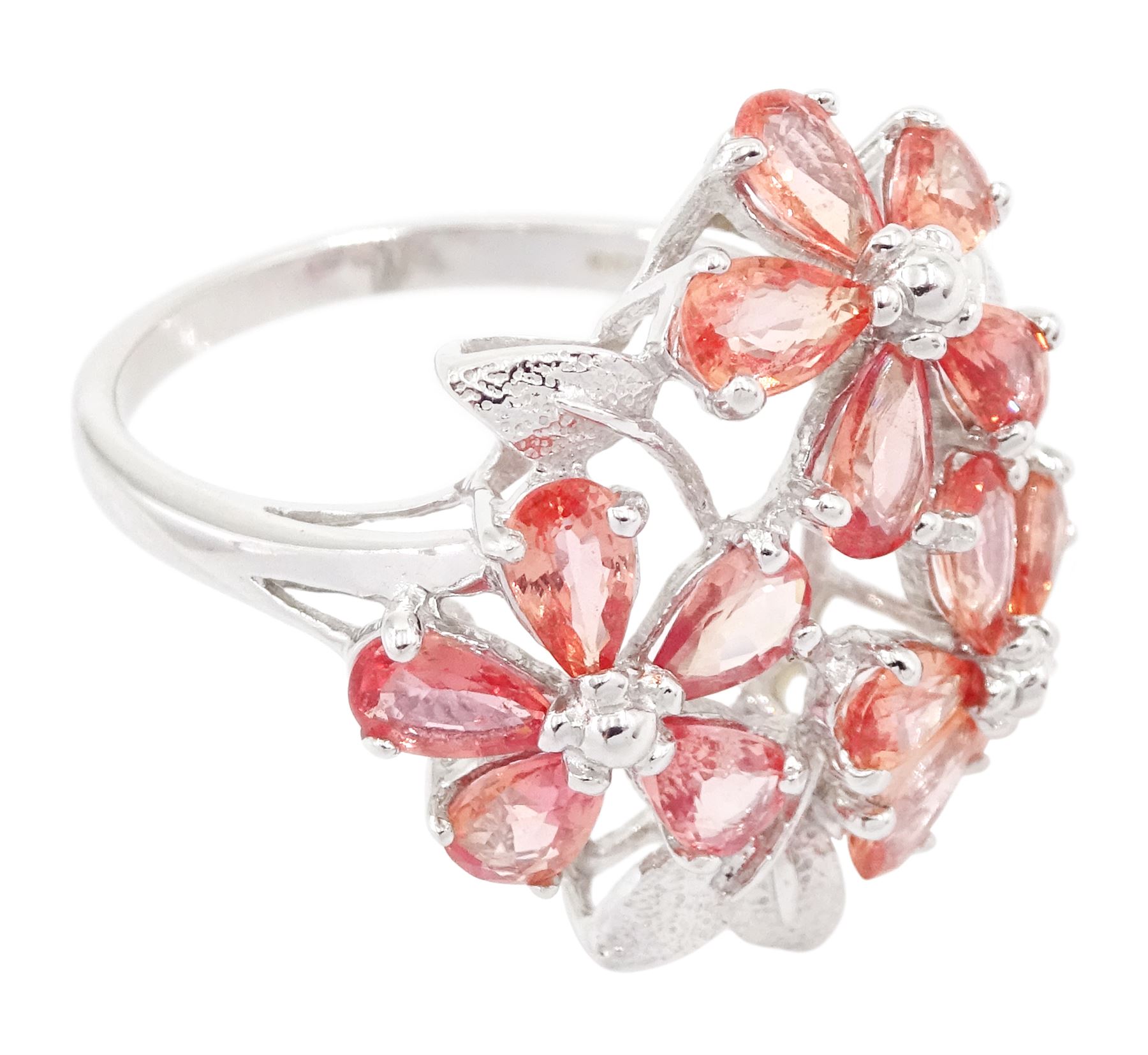 18ct white gold padparadscha sapphire flower head ring, three flower heads, each set with five pear cut sapphire petals, Birmingham 2006, total sapphire weight approx 2.65 carat