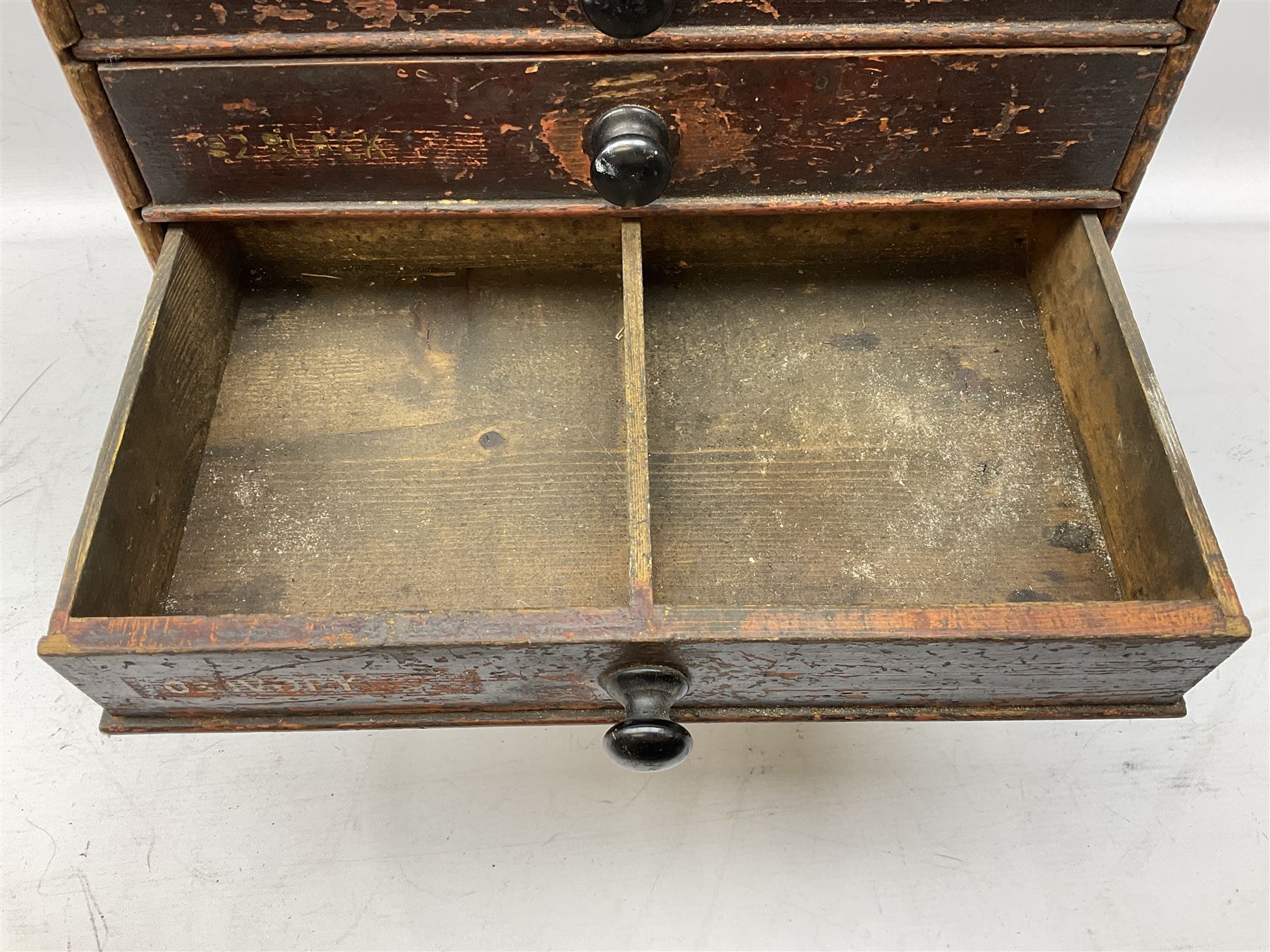 Early 20th Century Dewhurst table top chest, decorated with gilded 'Dewhurst's Sylko Machine Twist Strong Lustrous' lettering above six long drawers with names and numbers of cotton also detailed in gilt, H39cm