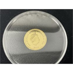 Queen Elizabeth II 2000 'The Queen Mother' silver proof five pound coin, 2000 'Millennium' silver proof five pounds, 2007 'Scouts' silver proof fifty pence, Tristan Da Cunha 2014 9ct gold 1 gram gold one crown coin, all cased with certificates and a 'Prince Charles 60th Birthday Commemorative Coin Cover' containing a 2008 silver proof five pound coin in folder (5)