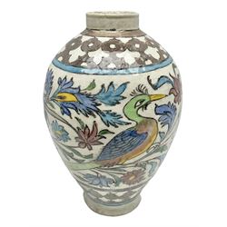 Persian stoneware vase of baluster form, decorated with flowers and birds in a geometric border, H38cm