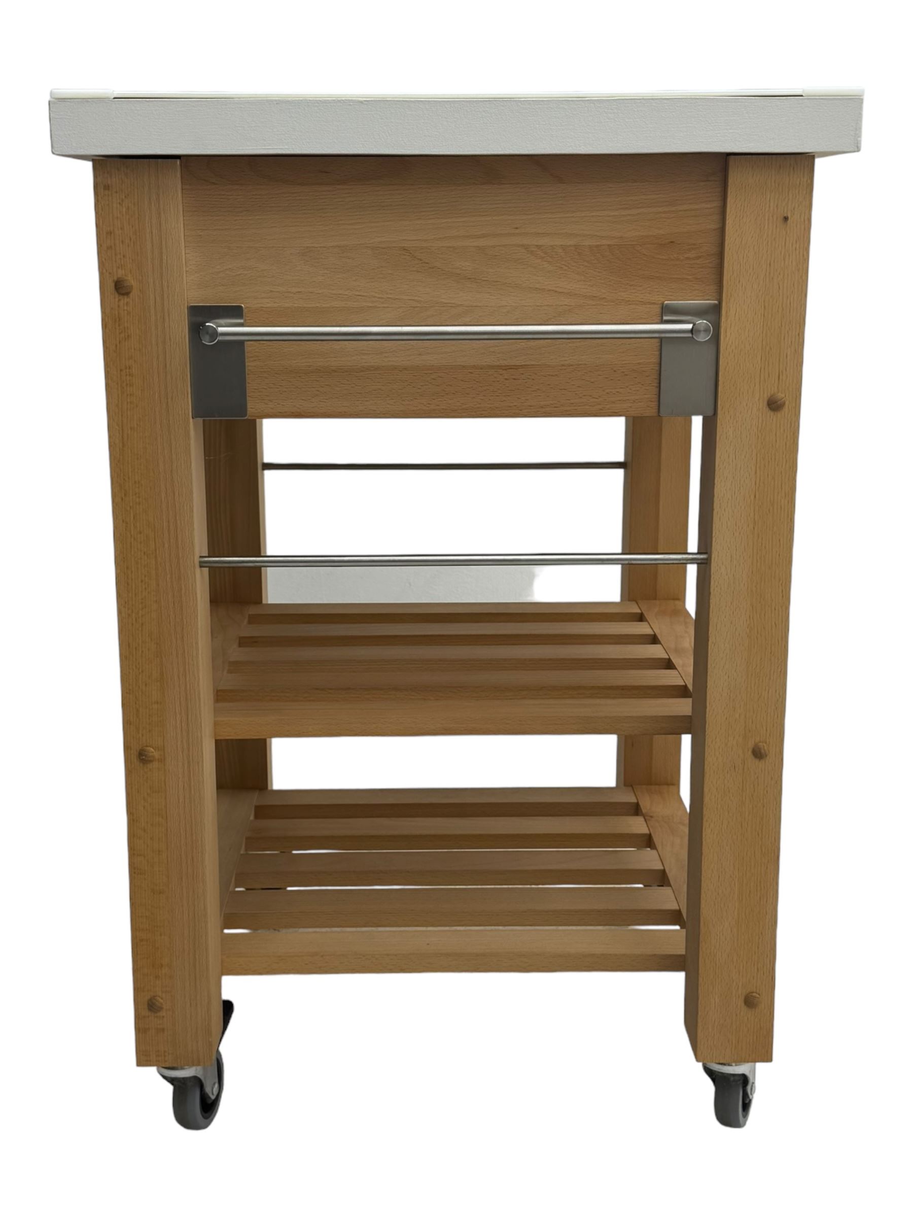 Contemporary butchers block kitchen trolley, white square top over beech frame, single pull-out drawer, dual slatted shelves, chrome towel rails, raised on square supports with castors