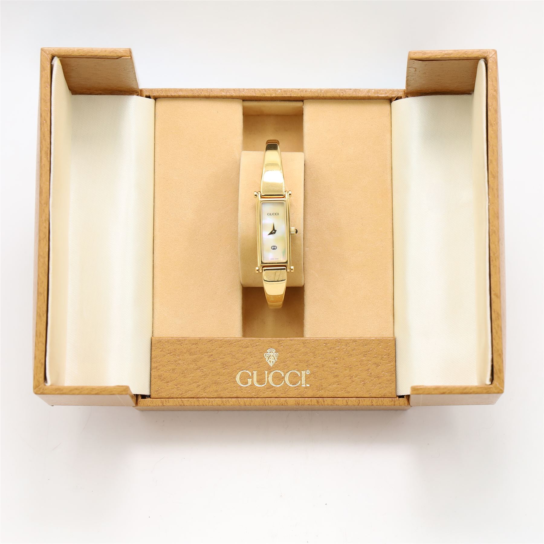 Gucci ladies gilt quartz wristwatch, Ref. 1500, with mother of pearl dial, boxed