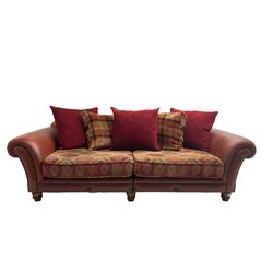 Grande traditional design four seat sofa, upholstered in studded red leather and kilim style fabric, with contrasting scatter cushions