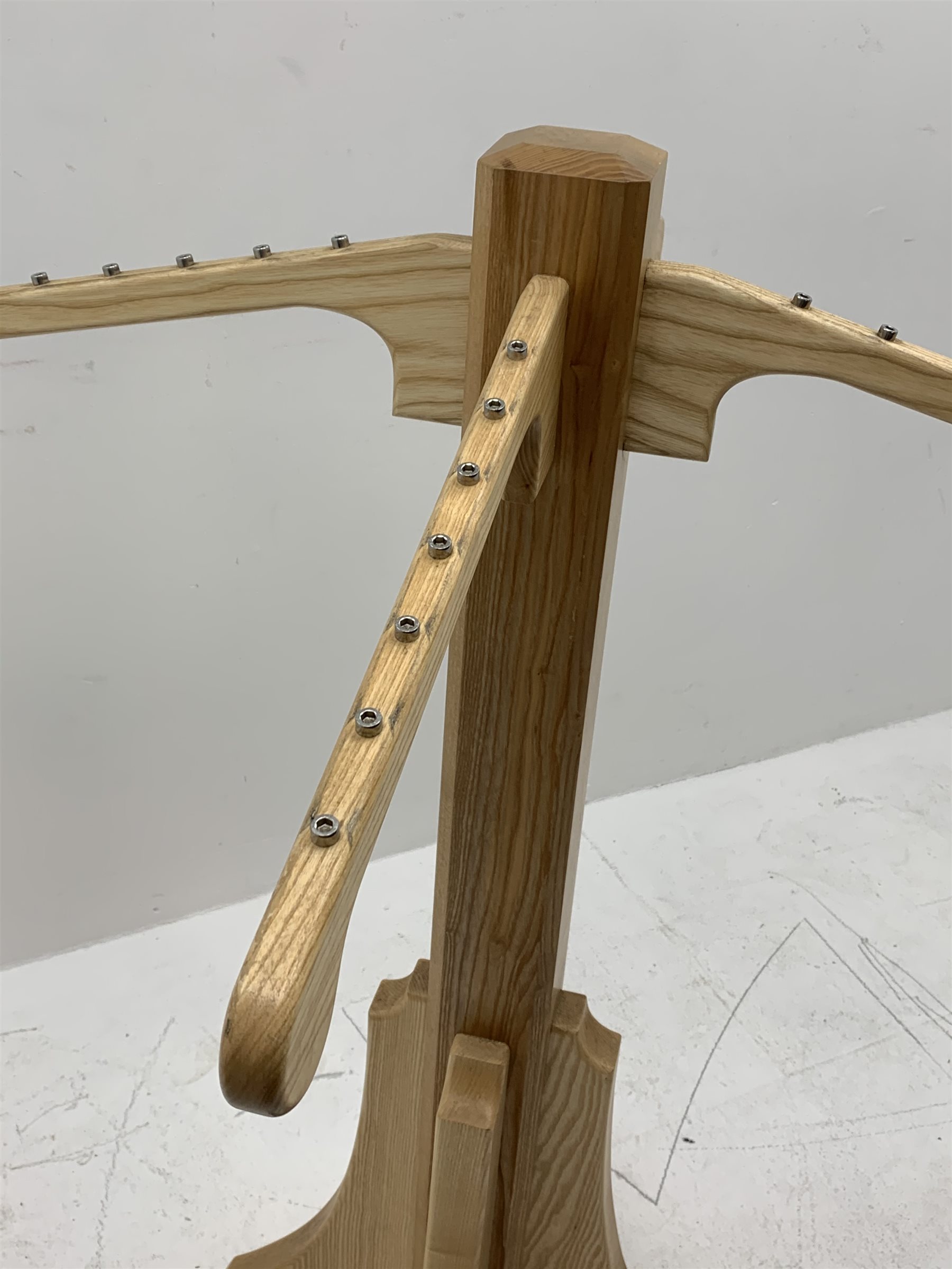 *Light ash wood clothes stand, four out splay branches, on cruciform base, H128cm, W100cm