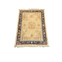 Chinese beige ground rug, blue border