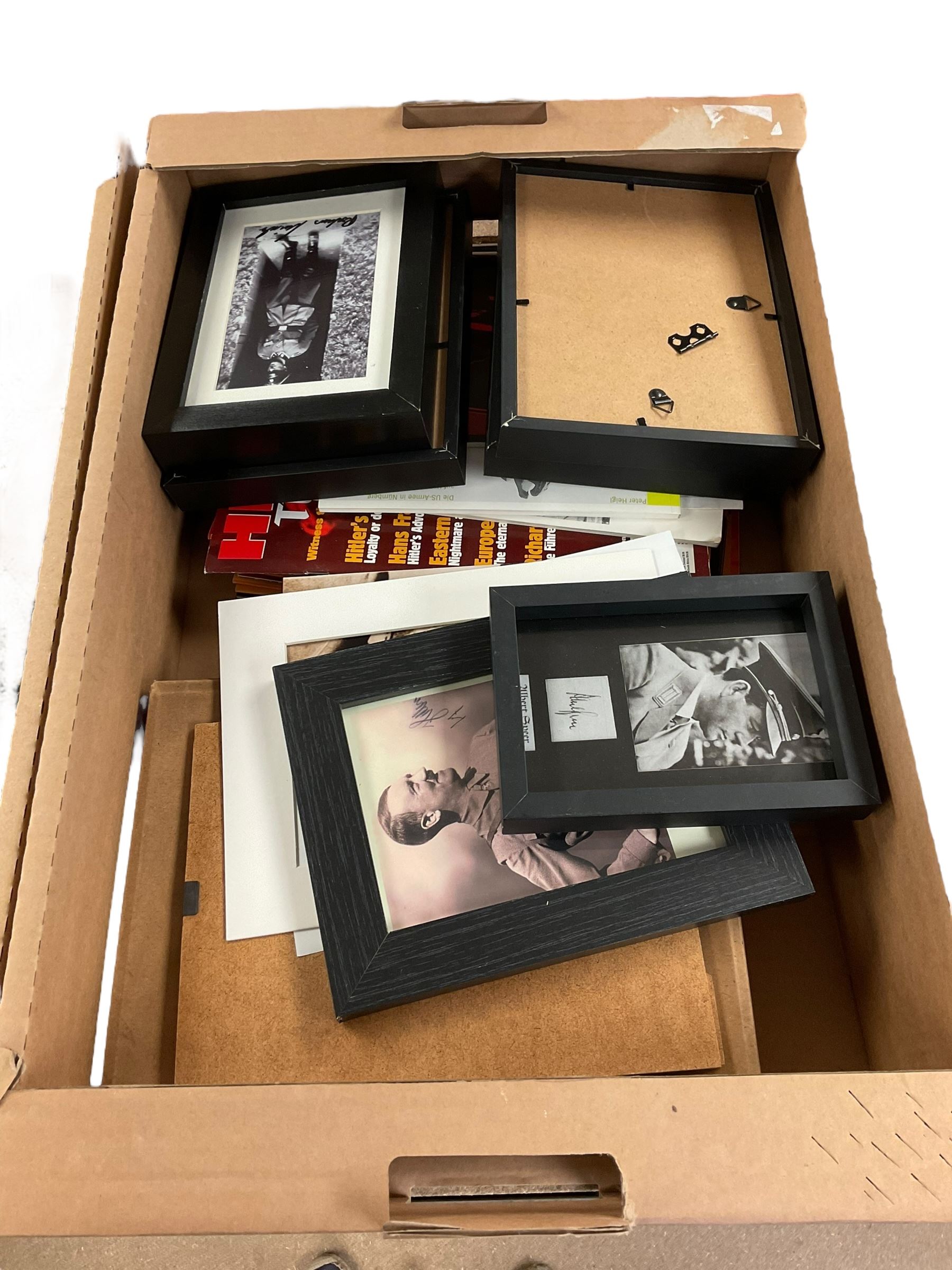 Collection of replica German WWII items, including solider figures, street sign etc, in three boxes 