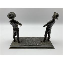 Spelter figure group, depicting two boys on a naturalistic rectangular base H24cm. 