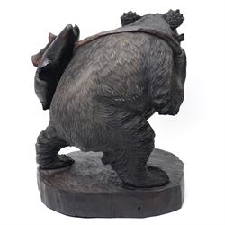 Large Black Forest style carved bear with a fish H50cm