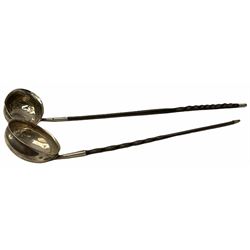 Two Georgian silver toddy ladles with baleen twist handles, (neither hallmarked), one with inset coin to bowl, together with a group of silver plate including cruet stand enclosing two glass bottles with stoppers, shaker and preserve pot with spoon, pair open salts with glass liners, etc. 