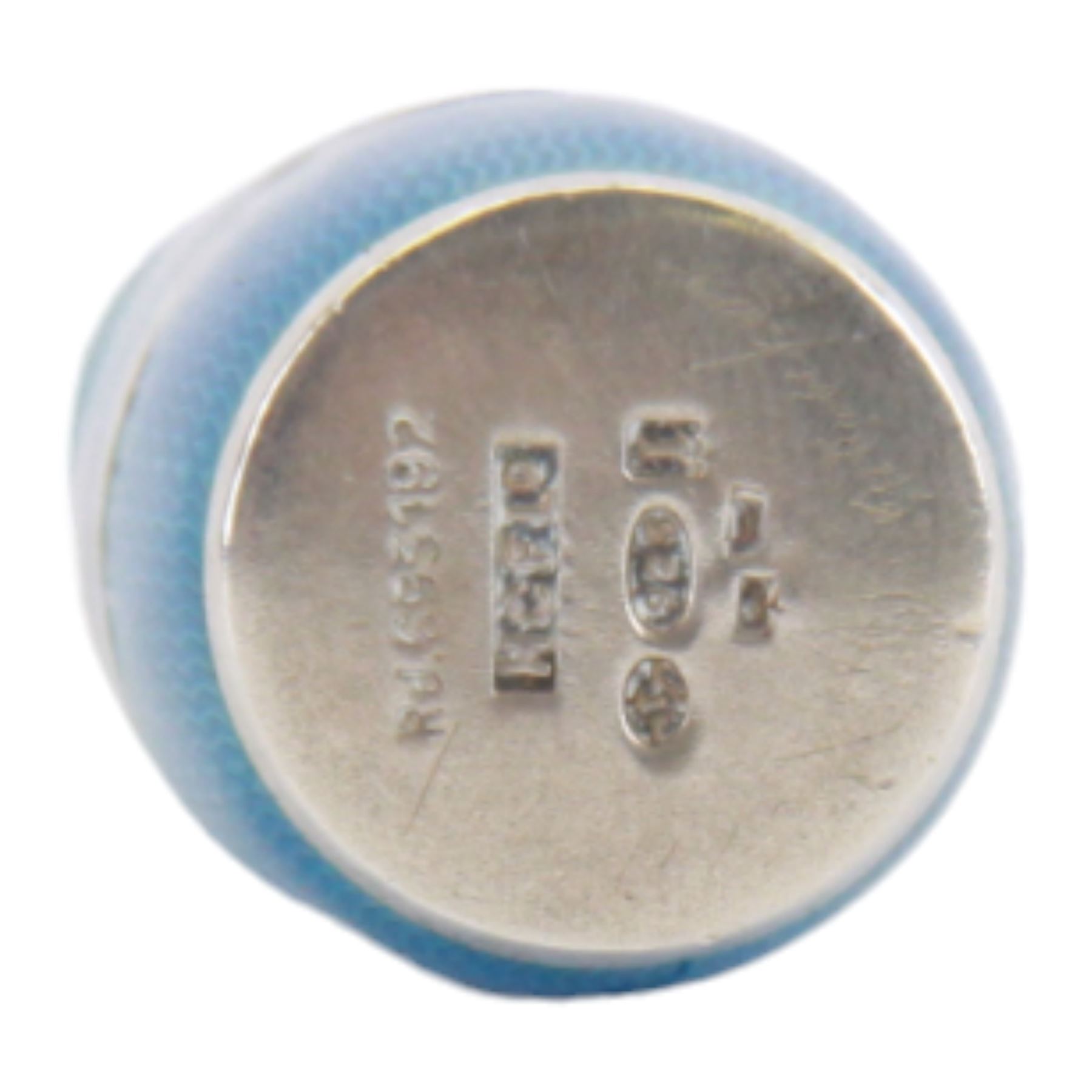 1920's Art Deco silver and enamel cheroot holder and case, the light blue engine turned enamel case of bottle form, with screw thread cover opening to reveal conforming cigarette holder, hallmarked H C Freeman Ltd, London import 1926, and also marked 925, case L6.5cm