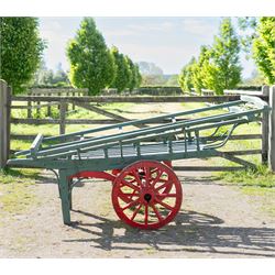 Costermonger’s Cart

A painted costermonger’s cart with green slatted timber body, red p...
