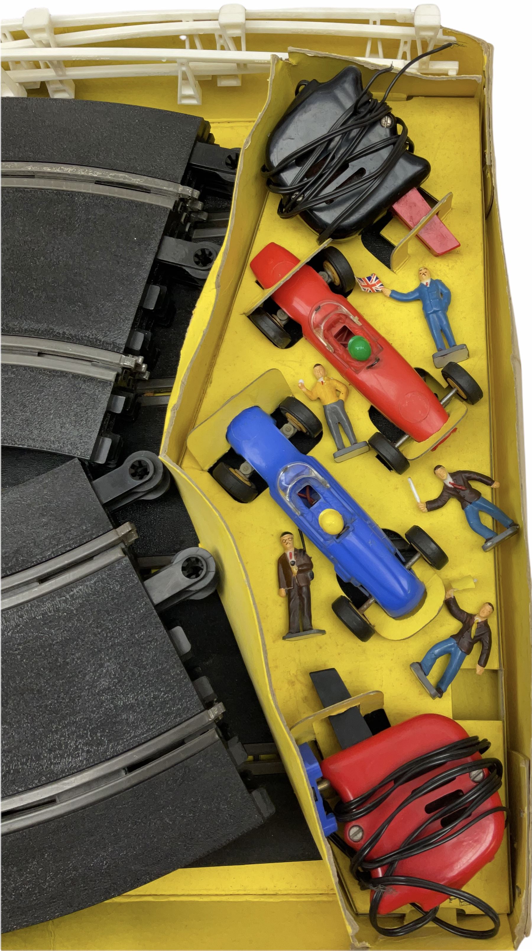 Scalextric - Marks & Spencer Starsky & Hutch set with '76 Gran Torino and Chevrolet Corvette cars, boxed; an earlier Tri-ang Scalextric 'Set 30' Model Motor Racing set containing Lotus and Cooper racing cars with controllers, track, figures and instruction pack, boxed; and a Scalextric catalogue Fifth edition c1964