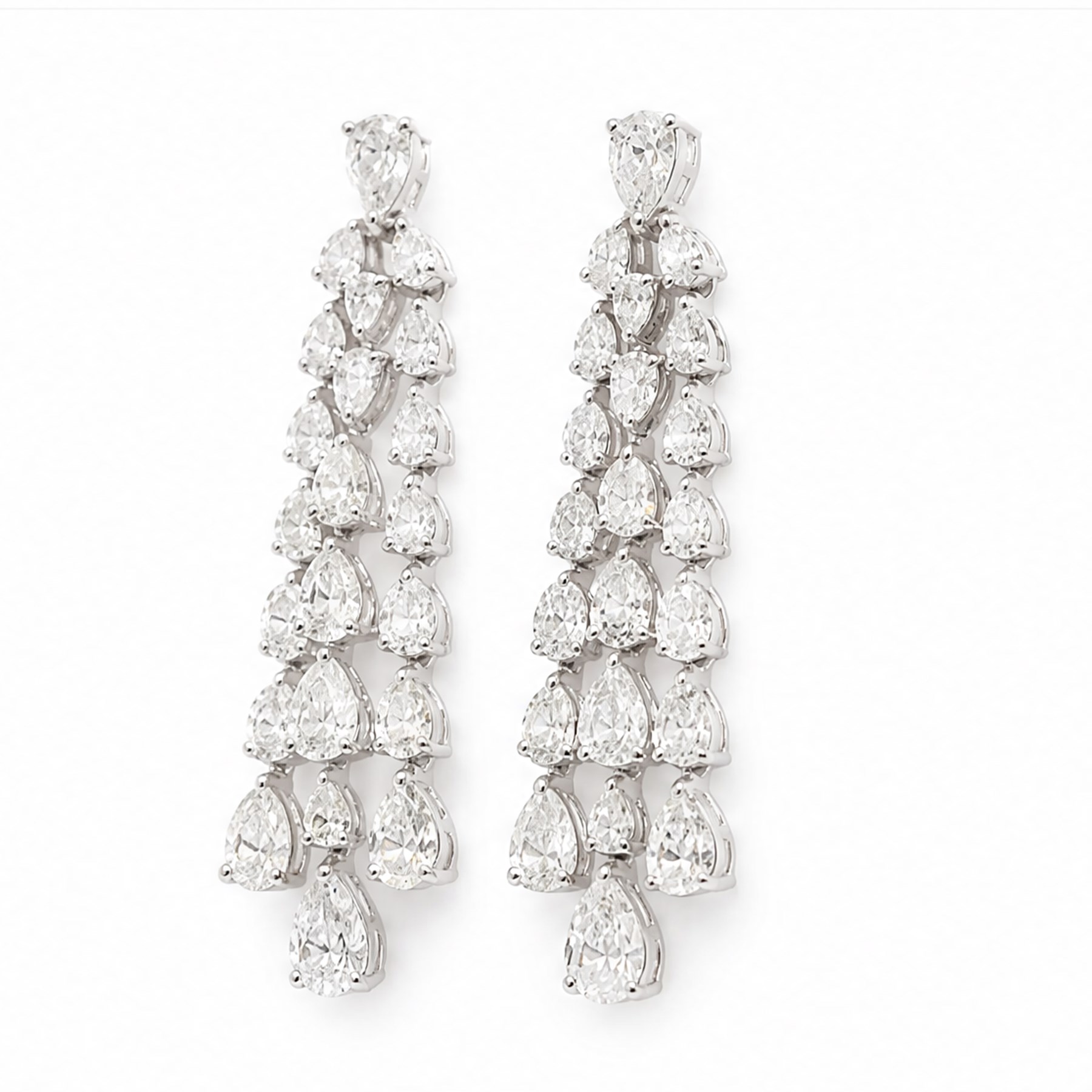 Pair of 18ct white gold diamond pendant earrings, each stud set with pear cut diamond, suspending three rows of graduating pear cut diamonds, total diamond weight approx 7.60 carat