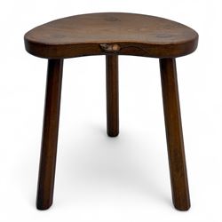 Mouseman - oak three-legged cow stool, kidney-shaped seat carved with the signature mouse motif, by the workshop of Robert Thompson, Kilburn