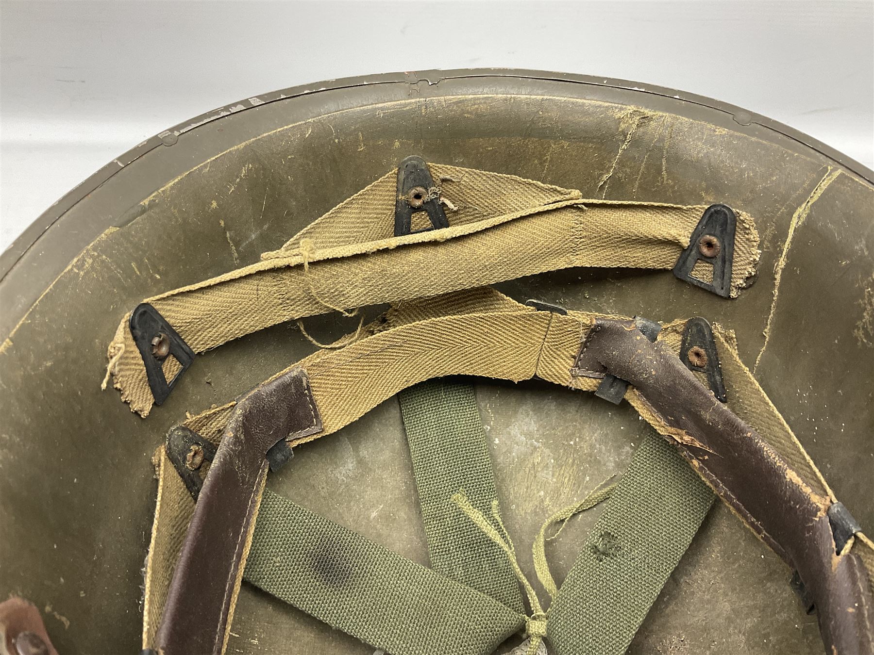 French Algerian War Red Cross steel helmet, marked 'CP ICA Esperaza 1955'; green finish with crudely painted Red Cross logo to the front