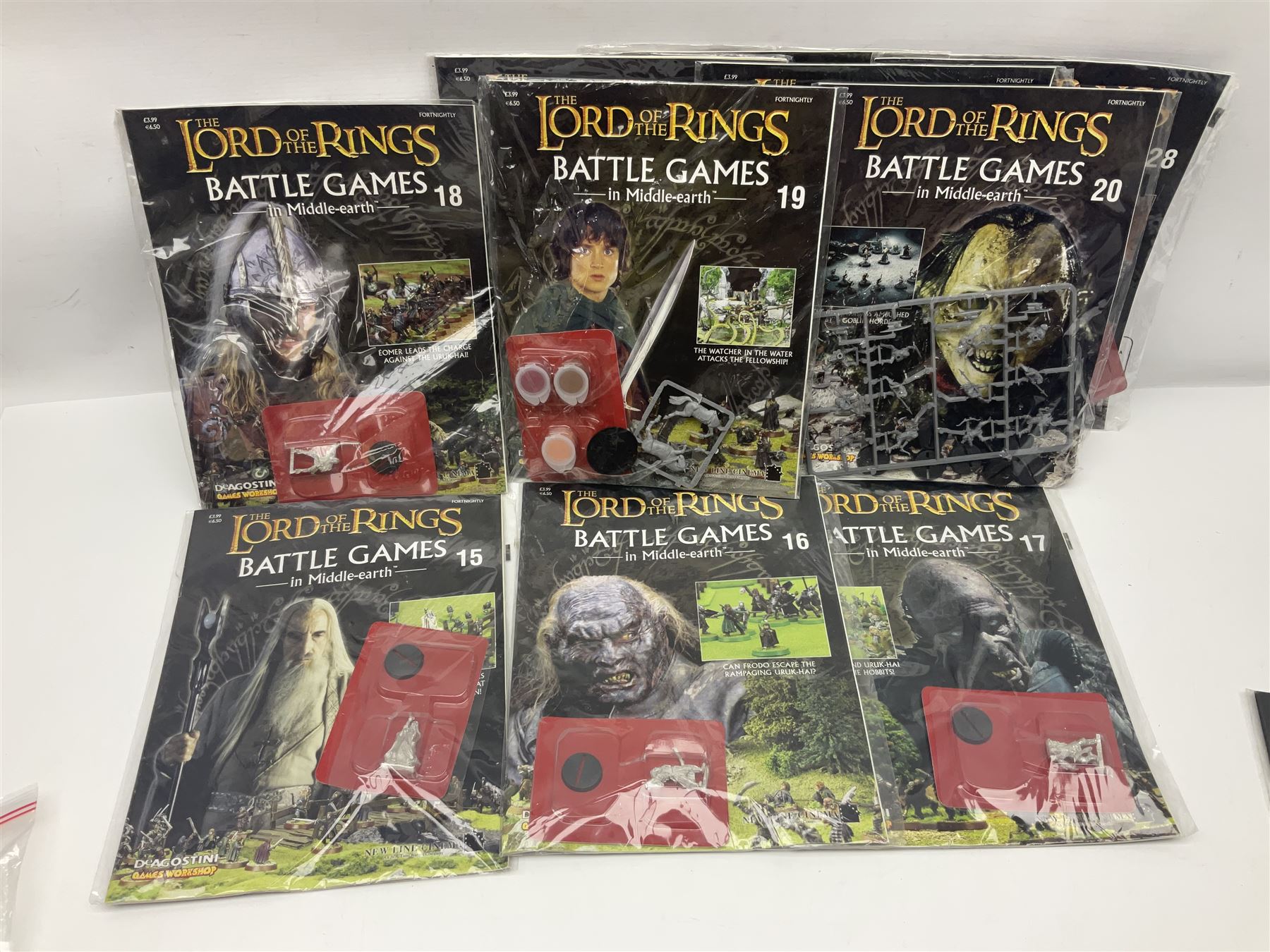 DeAgostini Lord of the Rings Battle Games in Middle-Earth magazines, issues 1 - 28 (lacking no.2), with models, all but one unopened, unbuilt and unpainted (27)