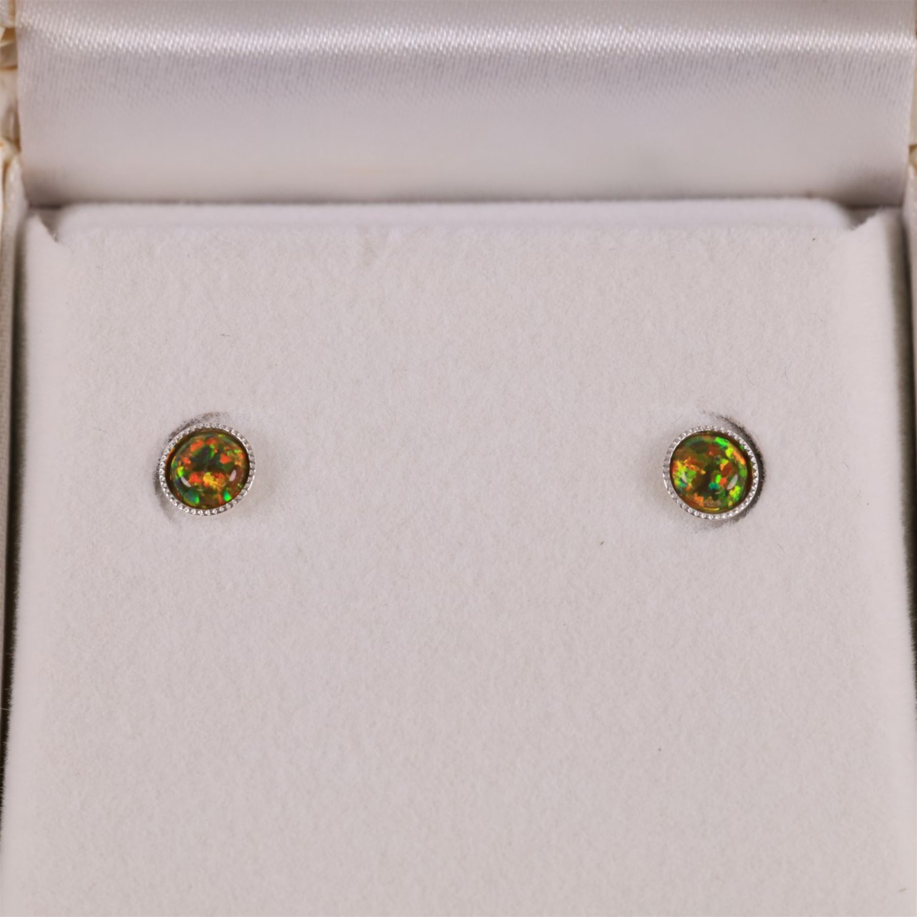 Pair of silver opal stud earrings, boxed, D5mm