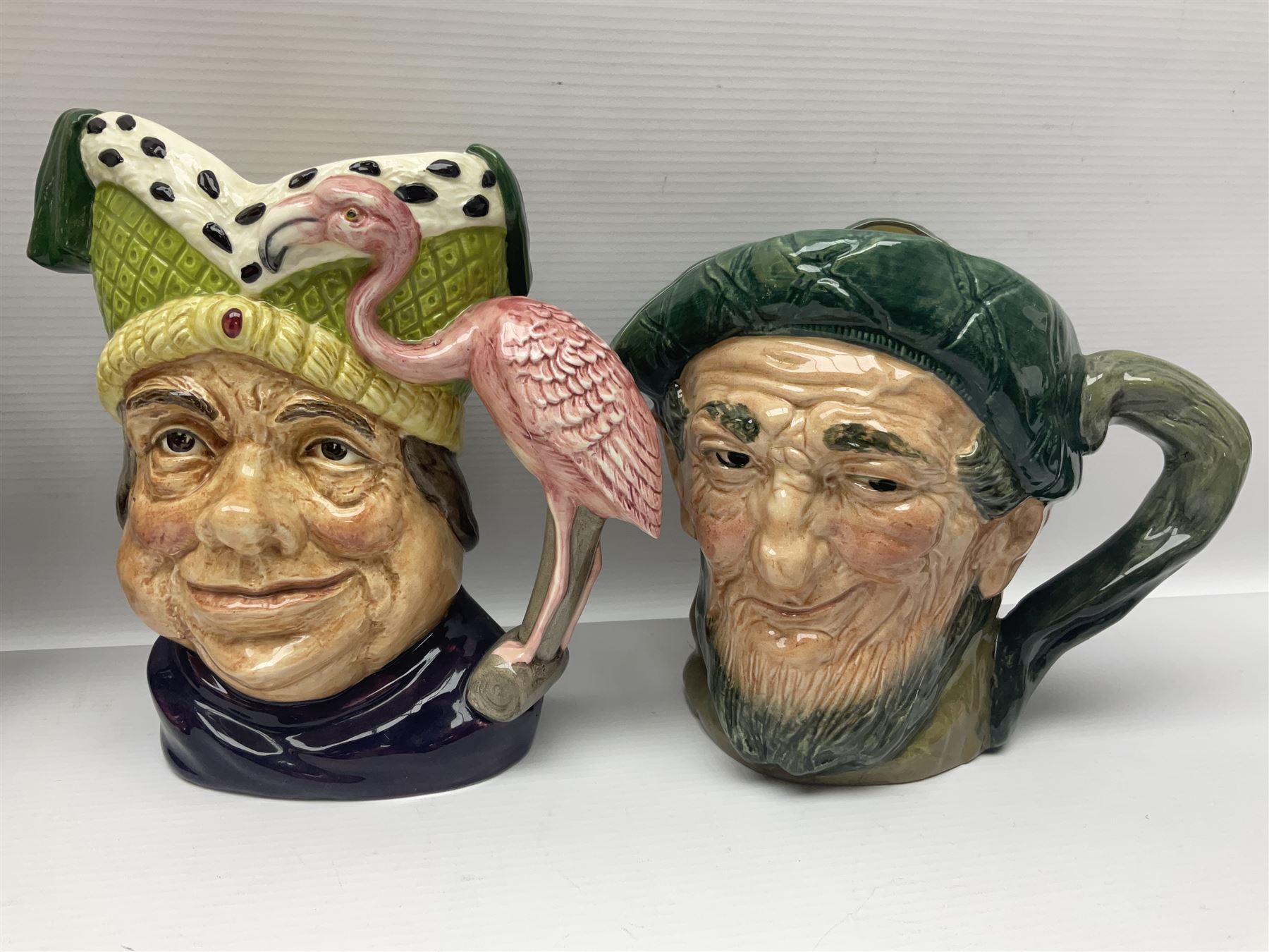 Twenty two Royal Doulton toby and character jugs, including Ugly Duchess D6599, Old Salt D6551, The Walrus & Carpenter D6600, Robin Hood D6534