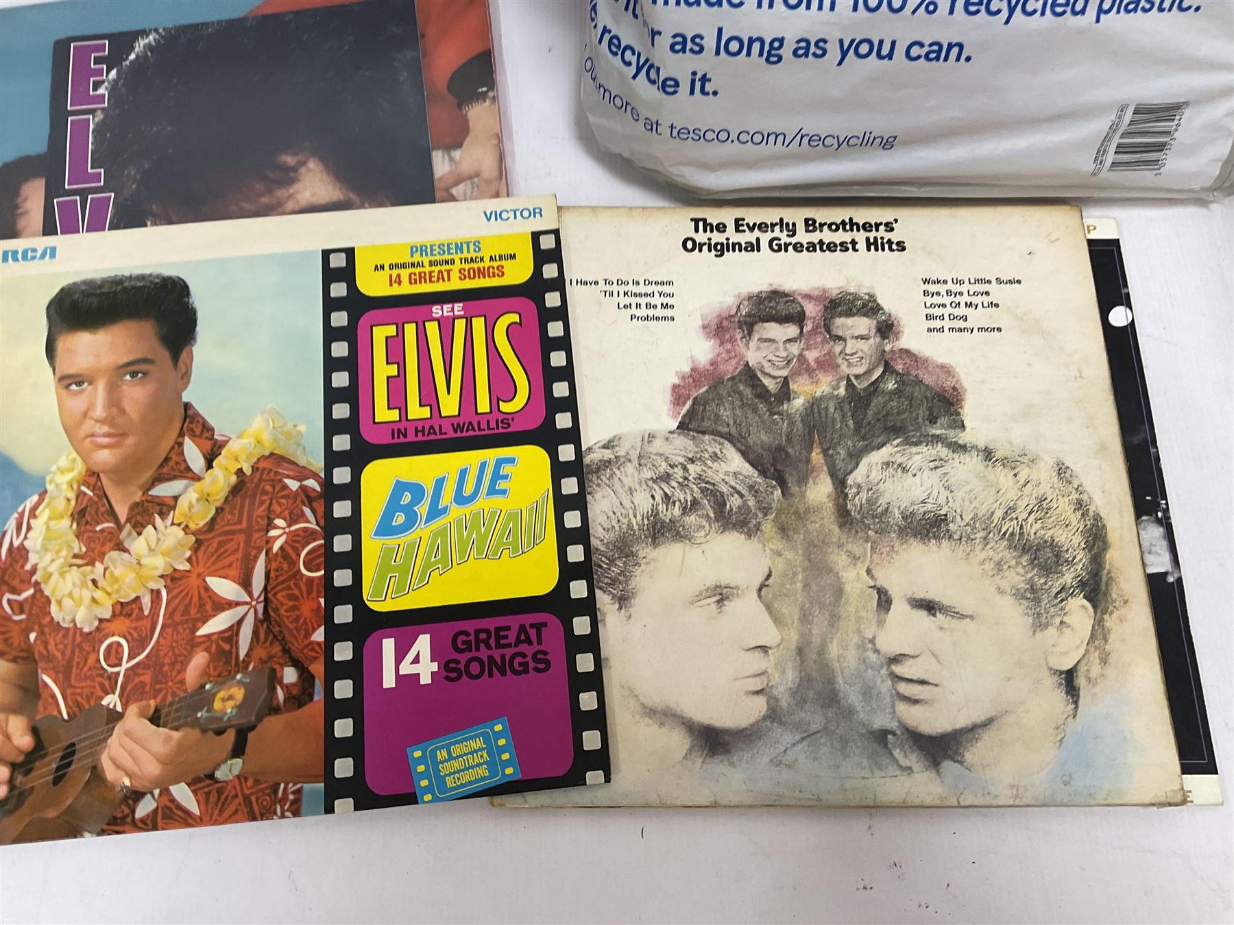Thirty-one LP records including Everly brothers, Elvis Presley, Joe Walsh etc; and quantity of cassette tapes, etc