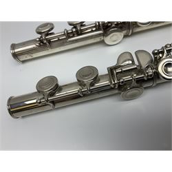Boosey & Hawkes London Regent three-piece flute, serial no.345447; in B&H Bandhite hard carrying case; and Deg Music Company Inc. USA Claudel Model three-piece flute, serial no.491718, in hard carrying case (2)