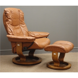  Ekorness stressless swivel armchair and matching stool upholstered in tan leather  