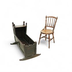 Early 18th century oak cradle dated AD 1710 and late 19th century kitchen chair, the cradl...