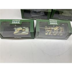Sixteen Atlas Editions die-cast models of military vehicles including six Ultimate Tank Collection; all in perspex display cases; fourteen boxed; with associated paperwork (16)