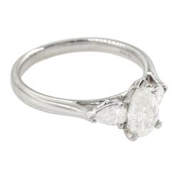 18ct white gold three stone pear cut diamond ring, hallmarked, principal diamond approx 0.70 carat