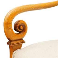 Pair of French Empire design fauteuil armchairs, high back over scrolled arm terminals, upholstered in cream fabric, on scroll carved cabriole supports