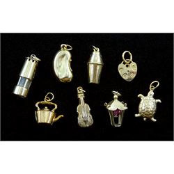Eight 9ct gold charms including tortoise, cello,teapot, lantern etc, all hallmarked (heart locket tested), approx 8.35gm