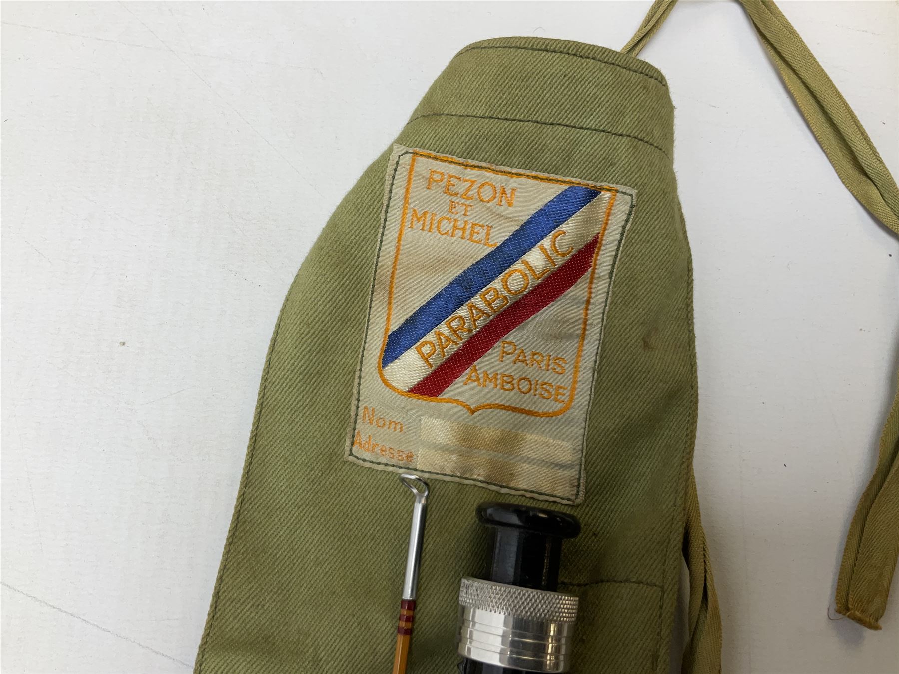 Four vintage split cane fishing rods in cloth bags, to include the Scottie Impregnated JS Sharpe rod and Pezon et Michel Farlow rod (4)