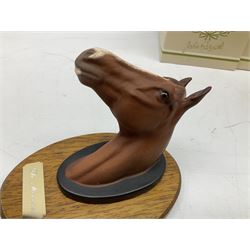 Beswick set of horse head wall plaques 'Champions all', comprising Arkle no.2700, The Minstrel no.2701, Red Rum no.2702, Troy no.2699, all with original boxes
