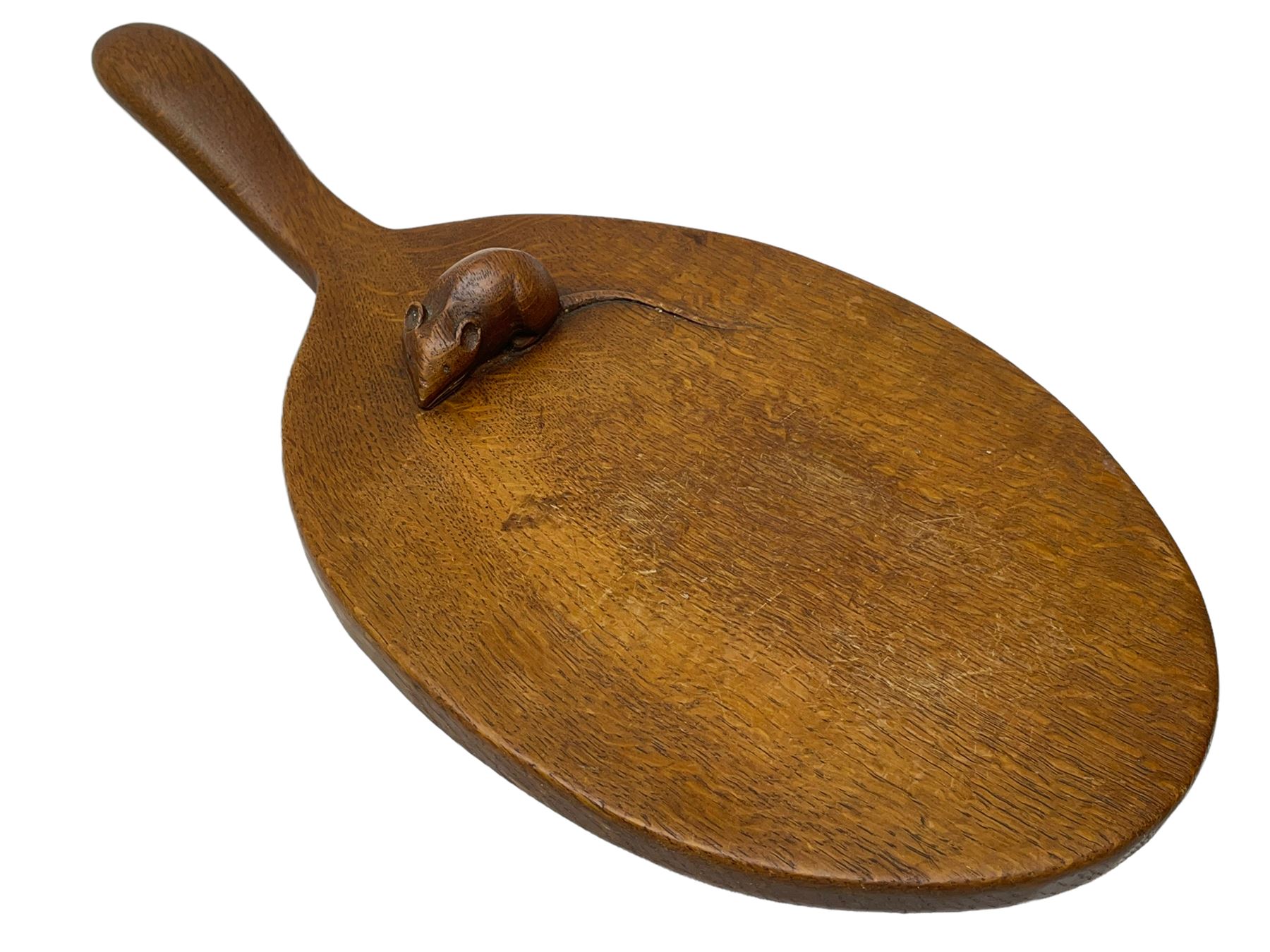 Mouseman - circa. 1940s/50s adzed oak cheese board, oval form with handle, the board carved with mouse signature, by Robert Thompson of Kilburn, L37cm D18cm 