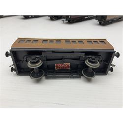 Exley '00' gauge - fourteen various coaches comprising four LMS maroon (3322 3rd, 2202 3rd, 6665 3rd and 388 Sleeping Car 3rd), LNER green/cream Buffet Car 21419, LNER teak 8639 1st, Southern green 6688 3rd, GWR brown/cream 3322 3rd, LNER 206 3rd, LNER 319 1st/3rd, SR green 351 3rd, SR green 188 Parcel Van, GWR 331 3rd and GWR 362 3rd; all unboxed (14)