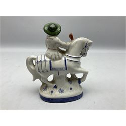 Rye pottery figure modelled as a lady upon a horse, with printed marks beneath, H19cm